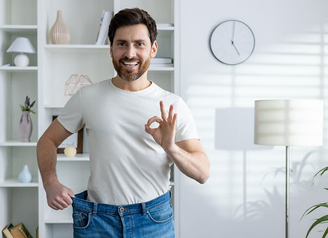 young-smiling-and-happy-man-standing-at-home-in-ov-2024-08-05-17-43-26-utc (4).jpg