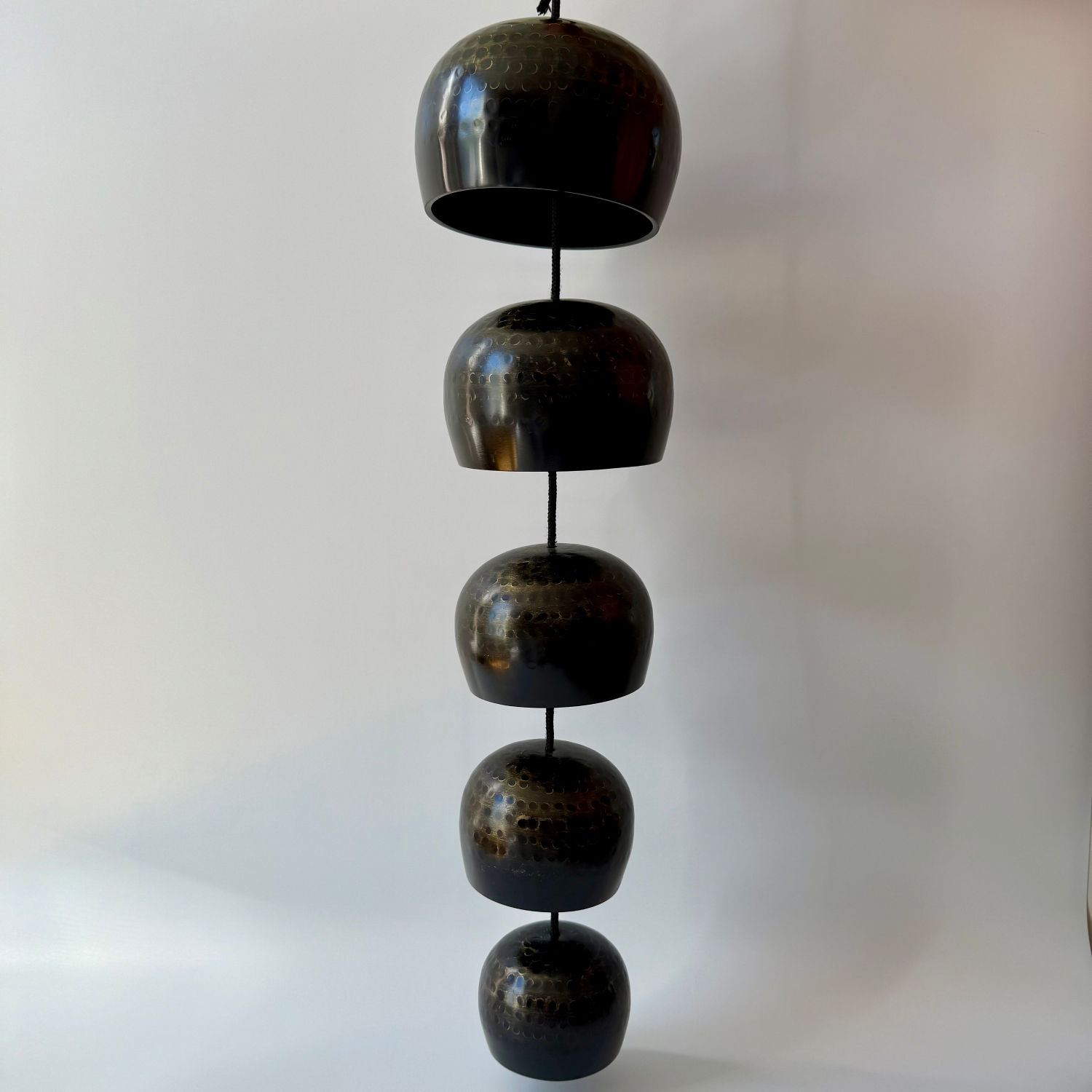 Hanging hand-hammered bell set