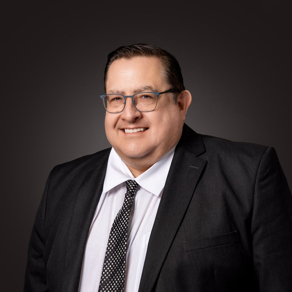 Professional man smiling for a LinkedIn headshot, Southend studio