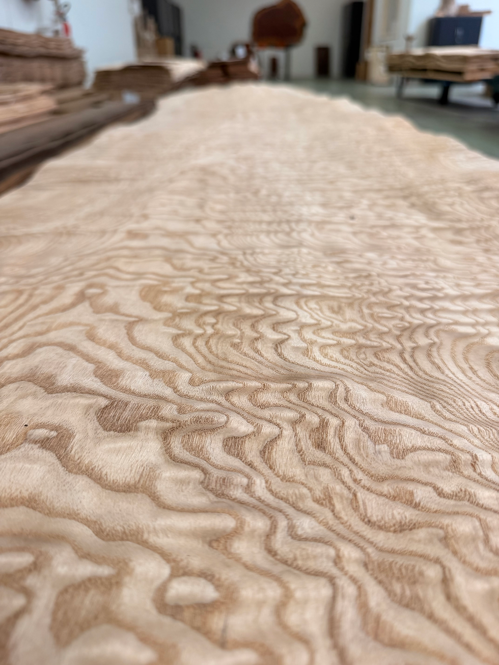 Detail of the organic texture of a luxury Taco Ash Burl