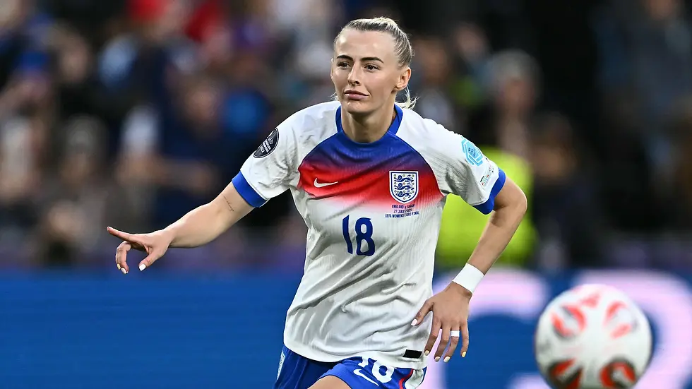 Chloe Kelly of England celebrating after scoring the winning penalty to beat Spain in the 2025 Euros Final.