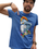 Thumbnail: Man wearing an absurd graphic tee featuring a unicorn pooping diamonds with a banner saying Ridin' Dirty