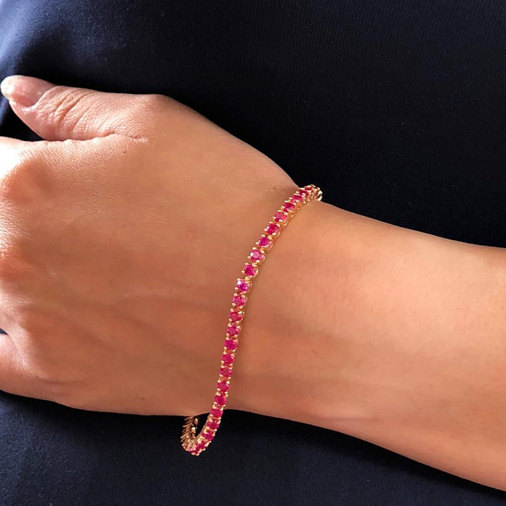 Pulseira riviera semijoia folhada em ouro com zircônias rosas