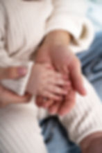 close-up-baby-hands-mother-hands.jpg