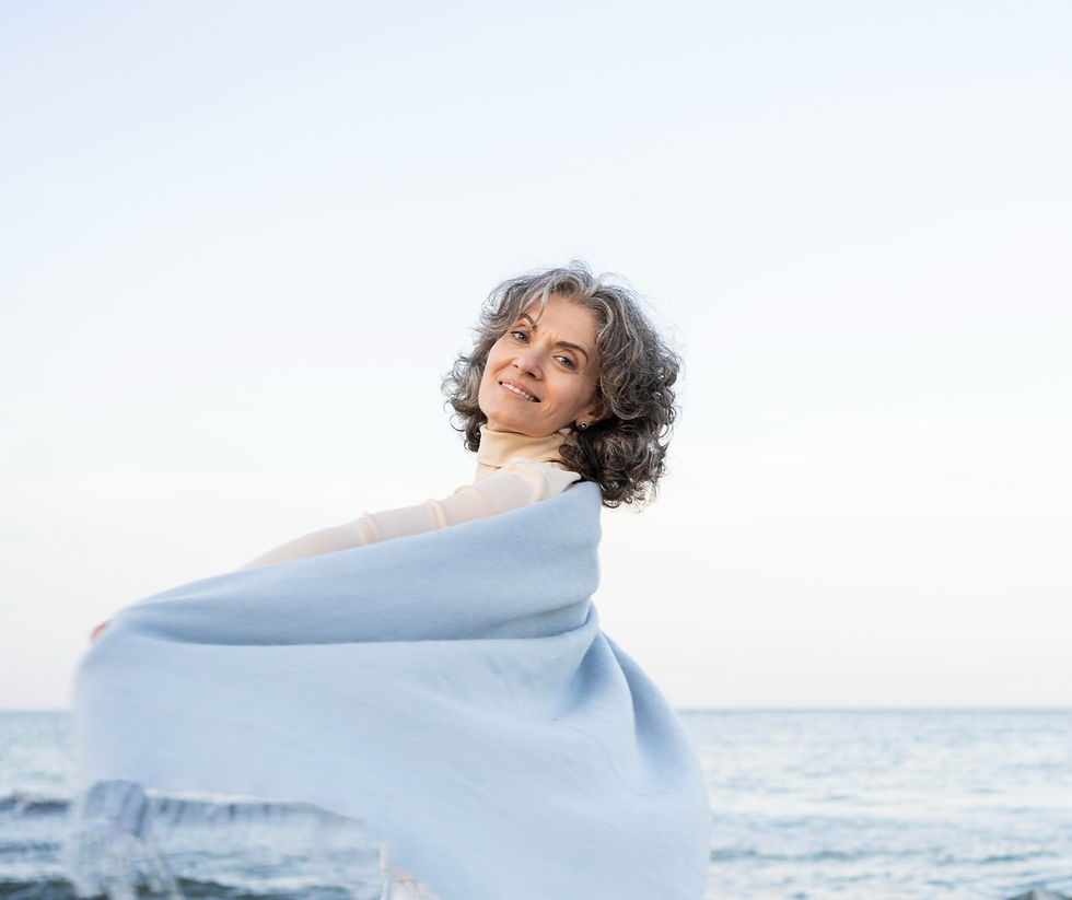 older-woman-enjoying-her-time-beach_edited.jpg