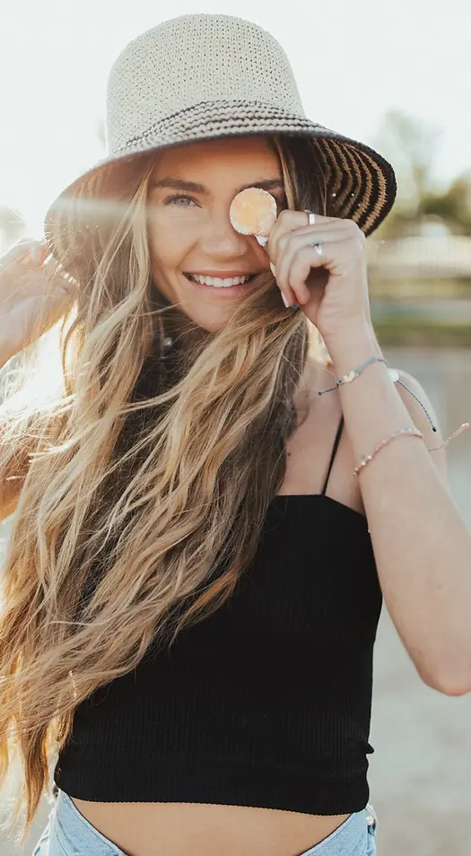 Sunlit blonde hair extensions styled at Hello Beautiful Signature Salon in Sugar Land