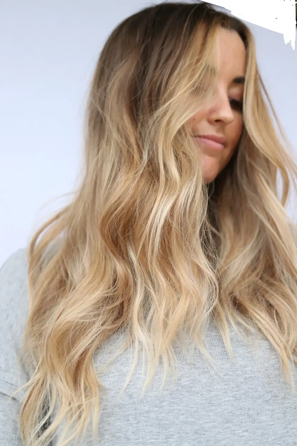 Finished hair extensions styled with a natural, seamless blend