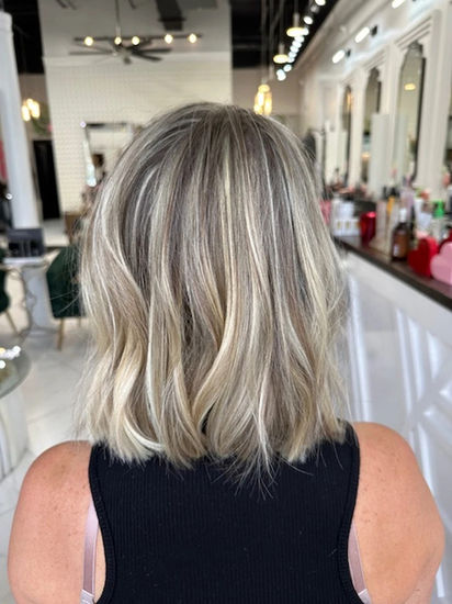 Ashy blonde bob haircut with highlights at Hello Beautiful Signature Salon