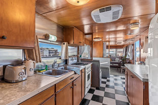 Spartan Mansion kitchen, highlighting the classic 1950s design all preserved to offer guests an authentic mid-century culinary experience.