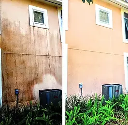 House wall cleaning transformation showing pressure washing removing grime and restoring a bright, clean surface