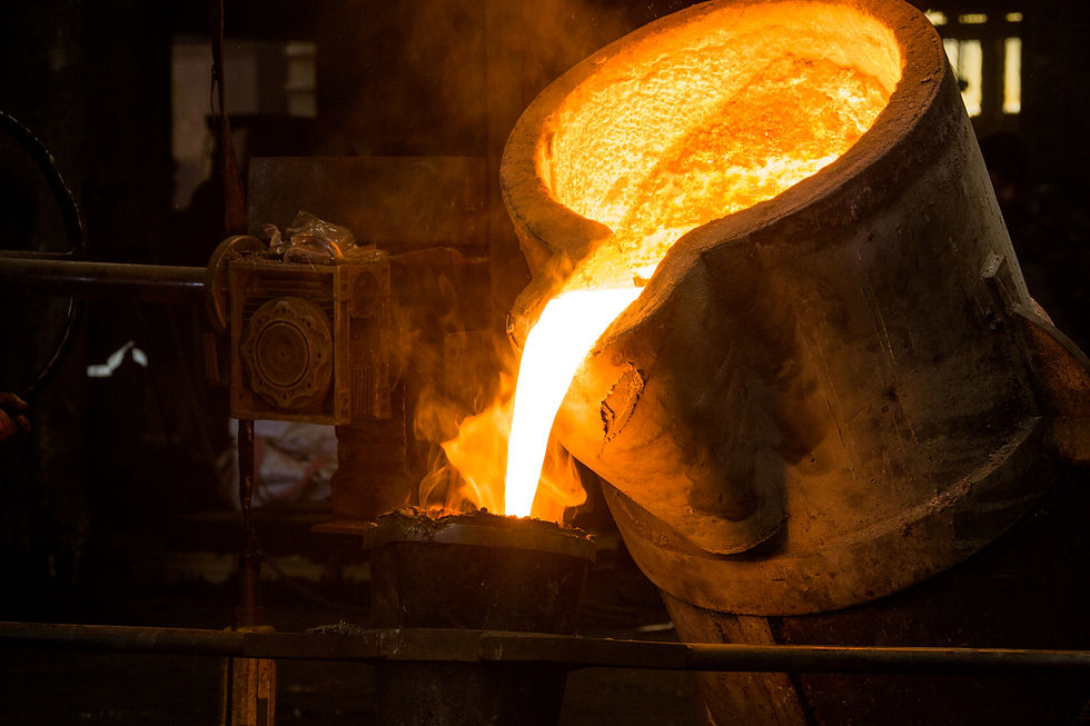 Metal casting process with red high temperature fire in metal part factory