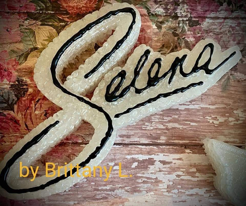 Thumbnail: Selena Signature