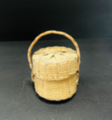 Miniature hand  woven baskets with lids. Suggested donation 25