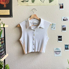A vintage white collared button-up tank top by Express.
