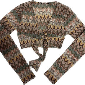 A tie-front long-sleeve earth tone 70's patterned crop shrug.