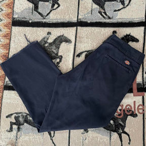 A navy blue pair of Dickie's pants.