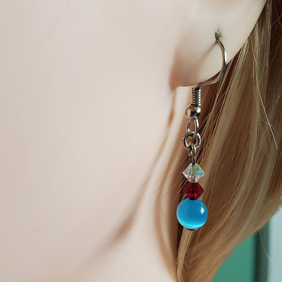 Thumbnail: Handmade Drop Earrings in Turquoise cats eye with Swarovski in Red and clear