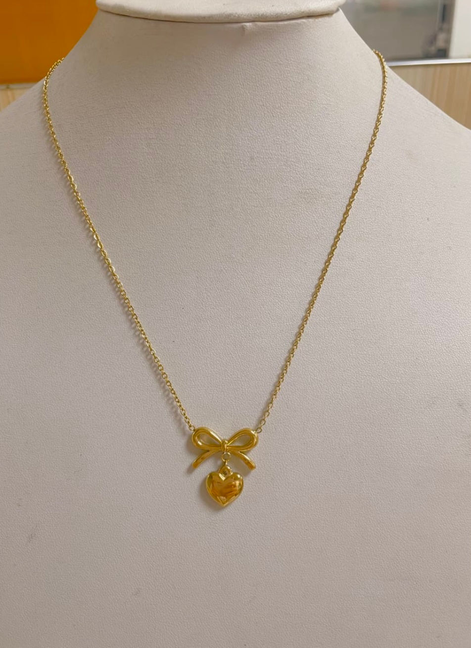 Thumbnail: Boss Naari Beaded Bow Heart Necklace