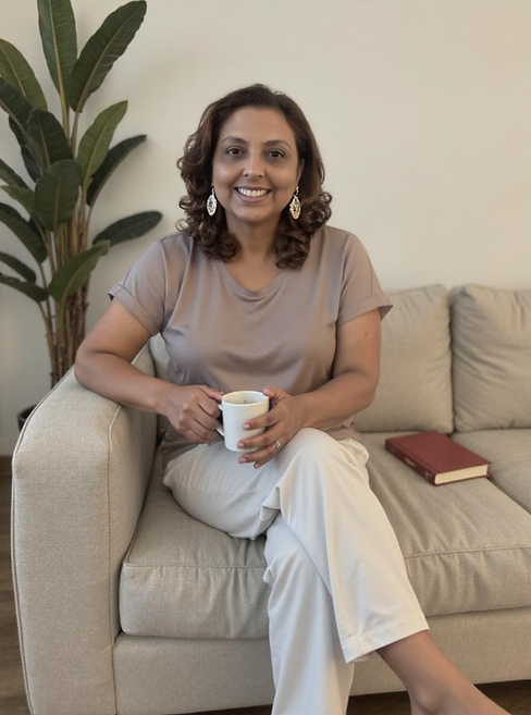 freepik__raquel-a-45yearold-woman-with-a-confident-and-sere__77443.png