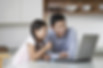 Father and daughter at computer