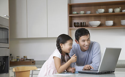 Father and daughter at computer
