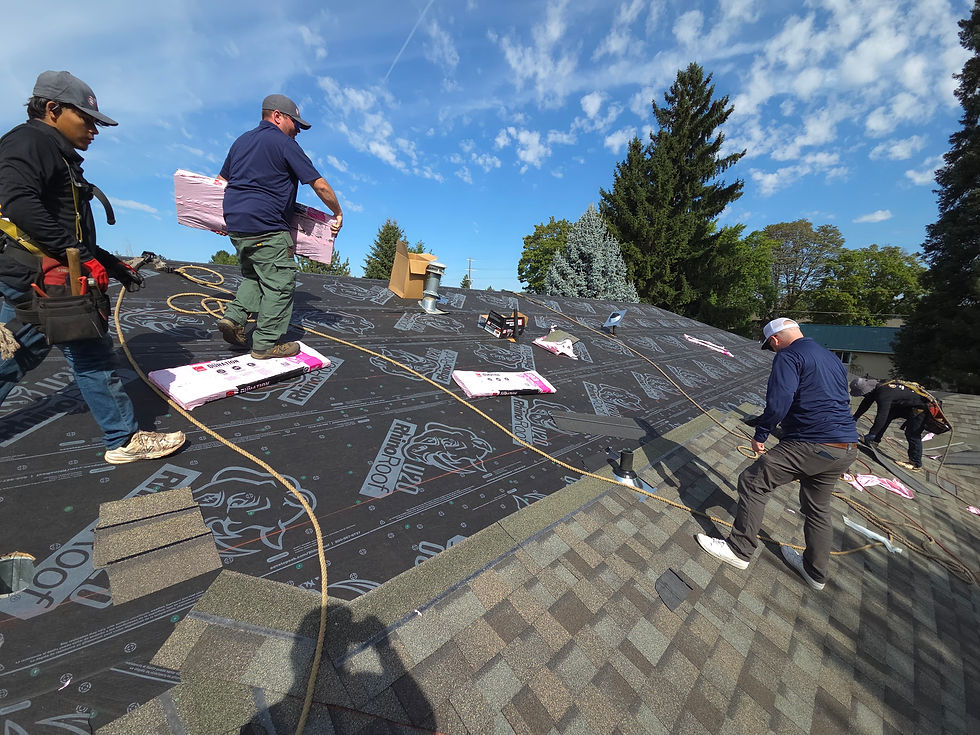 Crew Installing Shingles by First Rate Roofing Services