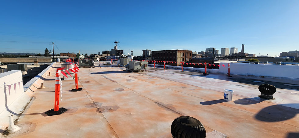 Downtown Roof Coating, Before by First Rate Roofing Services