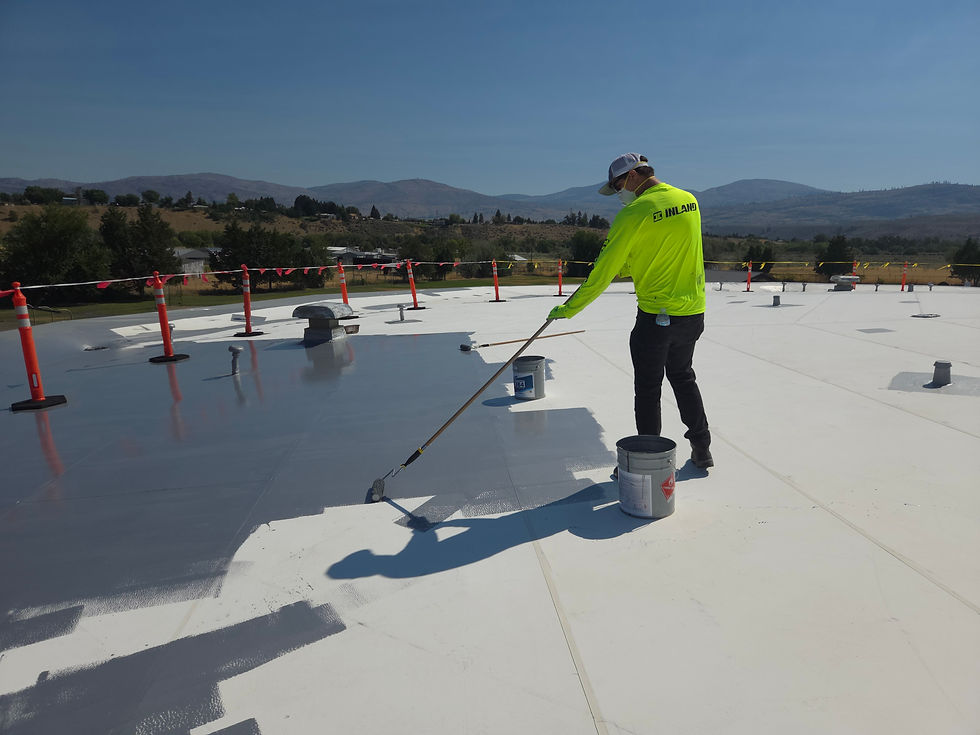 Omak Roof Coating, During by First Rate Roofing Services
