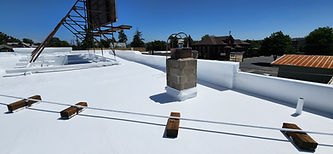 Coated commercial flat roof