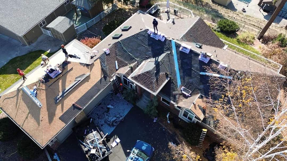 Hillside Home, During by First Rate Roofing Services