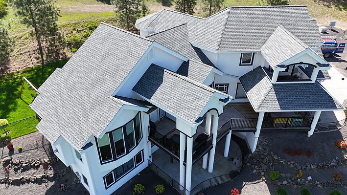 New shingle roof on a large home