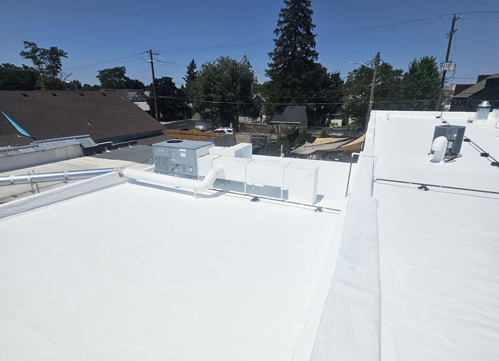 White TPO Reroof, After by First Rate Roofing Services