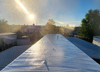 Finished white coating on a mobile home roof