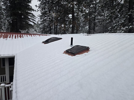 Snow-covered roof in winter near Spokane