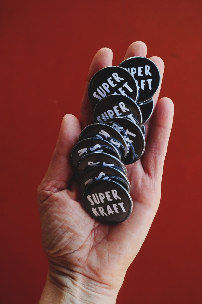 Miniaturbild: Button | Superkraft