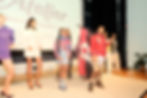 (Left to Right) Elysia Hernandez, Taliah Whitson, Kahliyah Thomas, Zachariah Williams, Tristan Jones, Isaiah Silvan, and Alkeim Raines Jr posing in Jenevesque Media's pre-screening runway show, co-hosted by Brownmill Company, at the Newark Black Film Festival Premiere of Atelier: The Story of Brownmill Company on July 22, 2026 | Photographed by Zion Laster