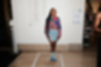 Kahliyah Thomas modeling at The Newark Museum of Art in the live exhibition "Brownmill: A One-of-One" by Jenevesque Media, curated by Elijah Pitt Goodson and Jennifer Edwards.