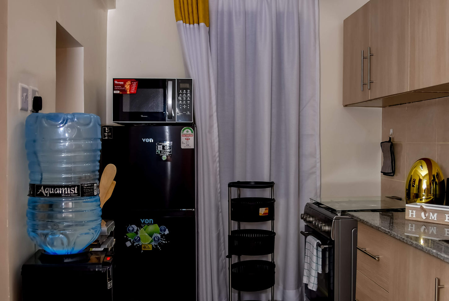Modern dining and kitchen area in Nakuru apartment
