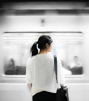 Woman Standing at Train