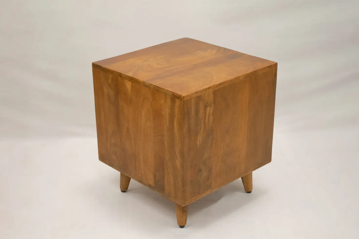 back side of the Wally side table in honey finish
