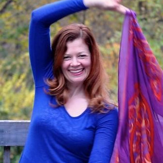 Erin Byron headshot play scarf-1.jpg