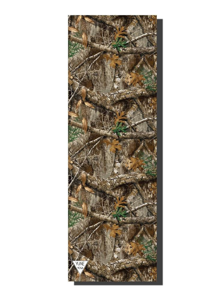 camo print yoga Matt with realtree edge pattern laid flat.  Forest-inspired design with leaves and branches.