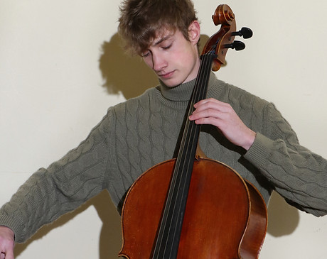 Felix pic with cello.jpg