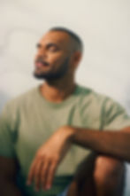 Young Black man relaxing peacefully and enjoying a moment of calm