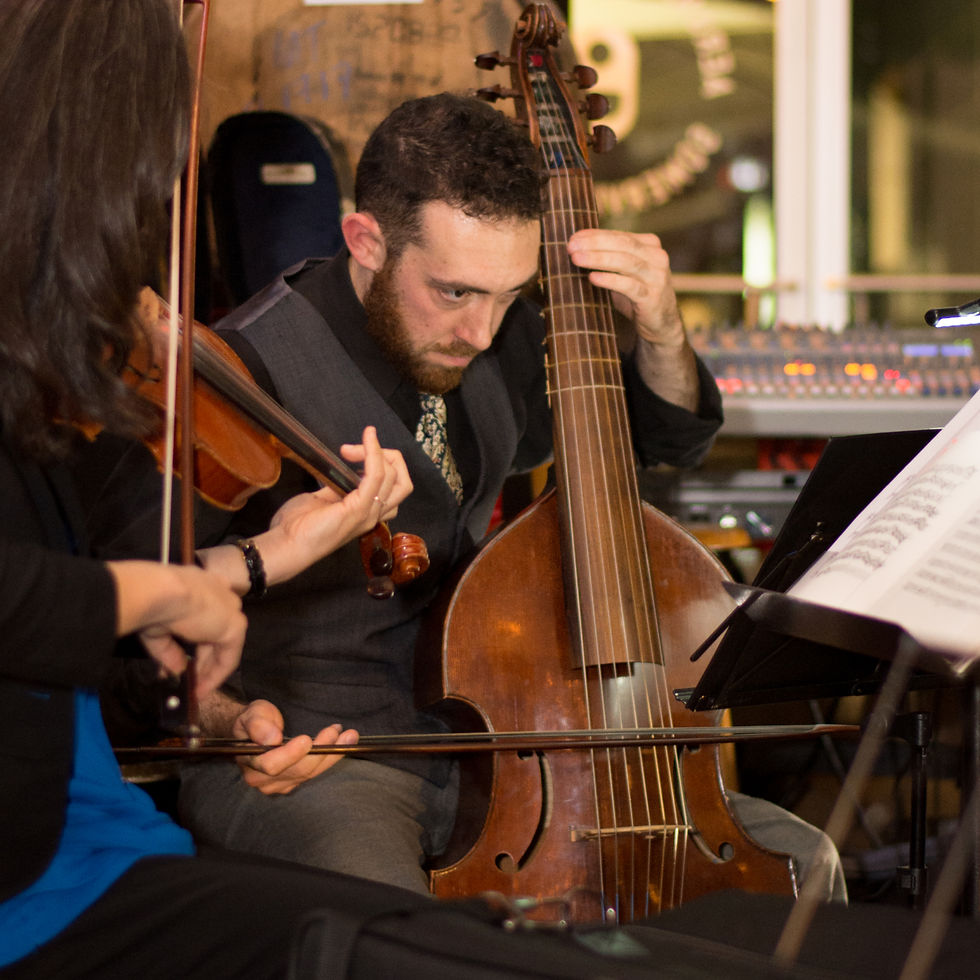 Andrew Arceci on viola da gamba, a distinctive instrument in Floyds Row's sound.