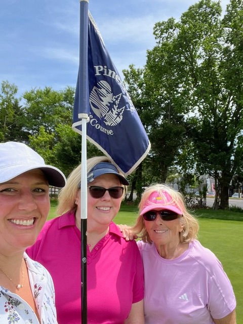 Kelsey Johnson, Ann Warner, Kathleen Hardy - Celebrating Ann's Par on the 9th hole!
