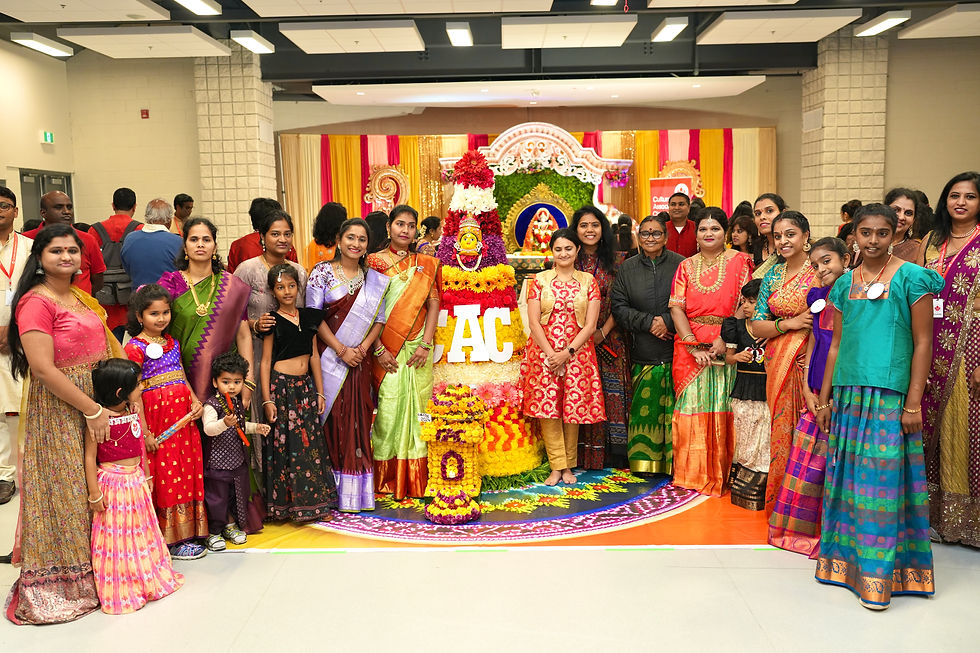 Group of happy people posing at a navratri event