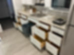 Granny Pod kitchen with accessible countertops, cabinets, and appliances for independent living.