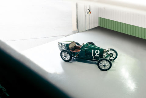 Green Bentley Blower JNR displayed indoors with polished flooring for Rennauto Brisbane.