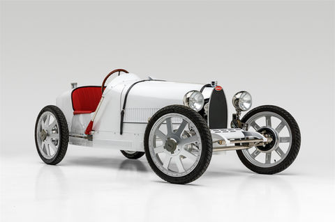 White Bugatti Type-style junior car photographed in a studio for Rennauto Brisbane.